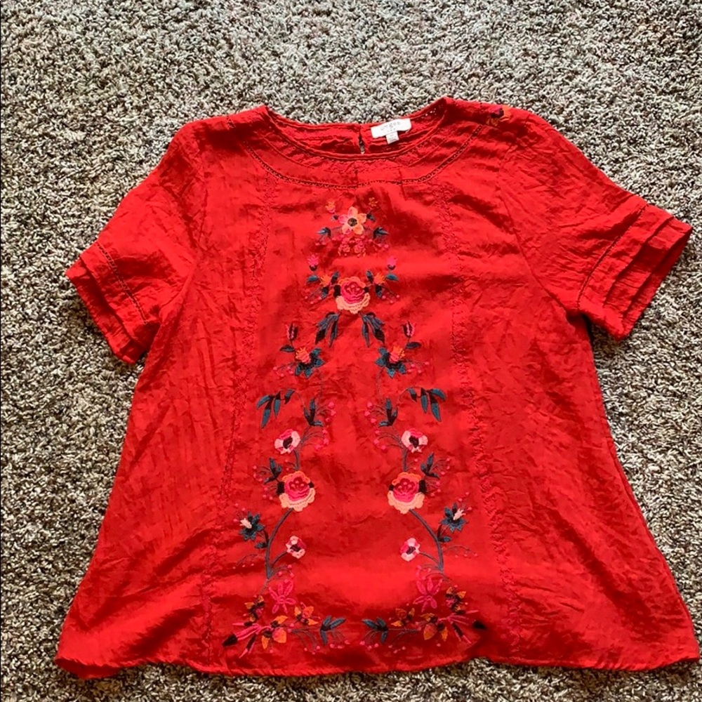Red embroidered blouse
